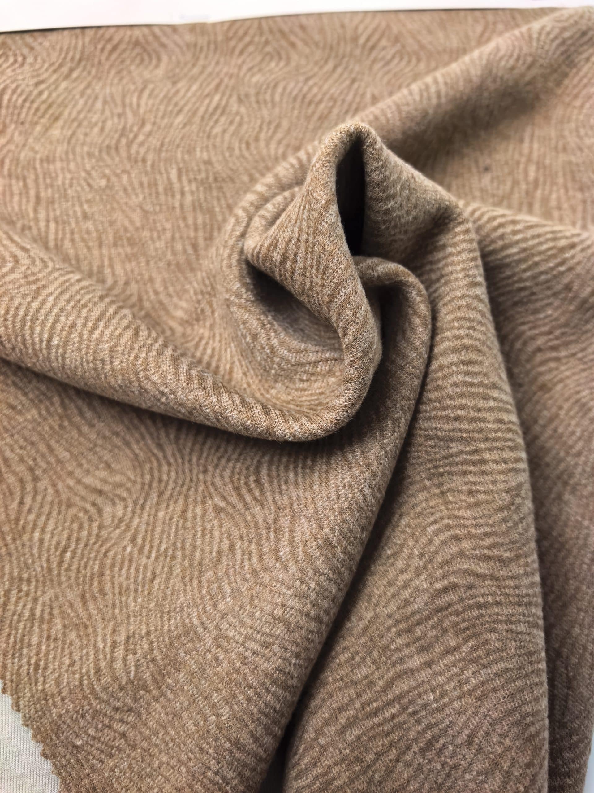 Textured brown fabric with subtle pattern