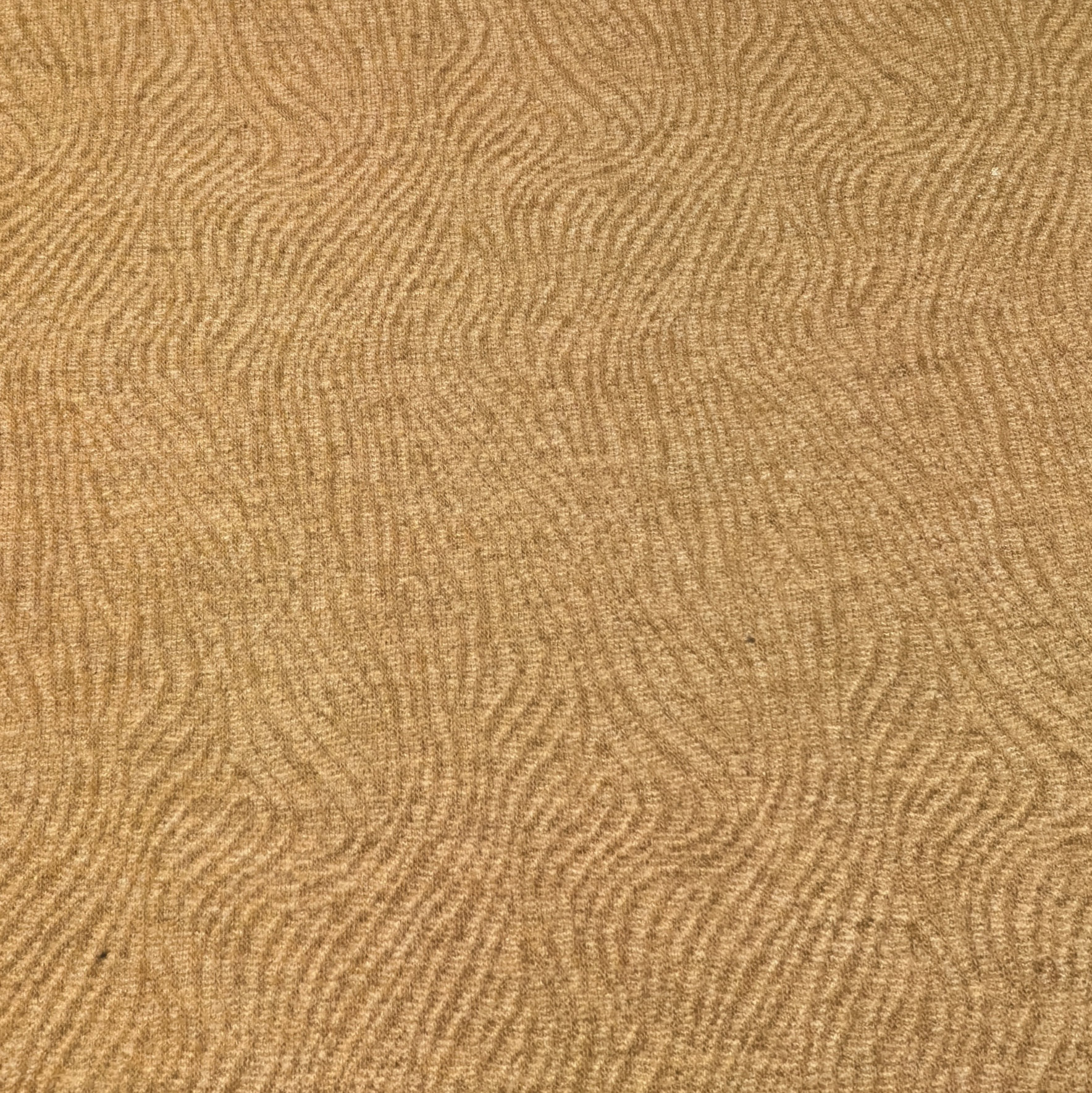 Textured sandy surface with wave patterns